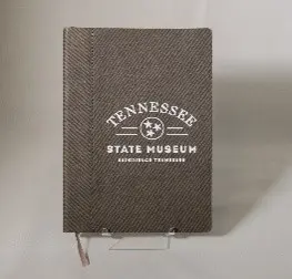 TSM Logo on the Journal on the display